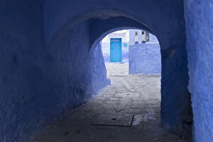 Morocco Collection: Africa, Morocco. A blue alley and door in the hilltown of Chefchaouen
