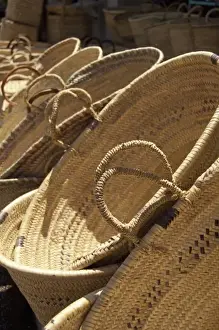 Images Dated 31st May 2010: Africa, Morocco, Casablanca. Central Market (aka Olive Market). Basket vendor