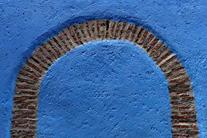 Brick Prints: Africa, Morocco, Chefchaouen. Arch design on blue wall