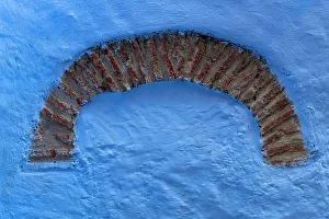Brick Prints: Africa, Morocco, Chefchaouen. Arch design on blue wall