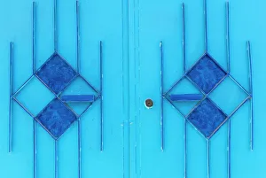 Lock Prints: Africa, Morocco, Chefchaouen. Close-up of designs on blue door