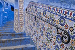 Stairway Prints: Africa, Morocco, Chefchaouen. Decorated tile wall of stairway