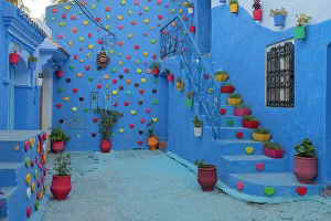 Stairway Prints: Africa, Morocco, Chefchaouen. Heart decorations on residential walls and stairways