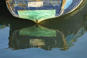 Morocco Gallery: Africa, Morocco, Essouira. An artistic watercolor effect of a wooden boat floating