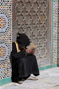 University Prints: Africa, Morocco, Fes. Reading at the Al Attarine Madersa