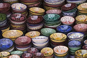 Bowl Prints: Africa, Morocco, Marrakech. Colorfully painted ceramic bowls for sale in a souk, a shop