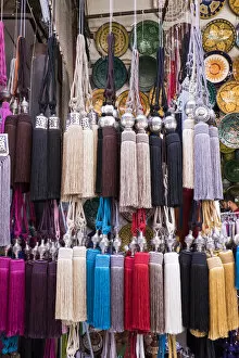 Morocco Gallery: Africa, Morocco, Marrakech. Curtain tie-backs for sale at a market stall in the medina