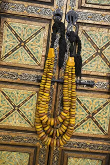 Morocco Collection: Africa, Morocco, Tinerhir. Traditional necklace of Berber woman hangs on an ornate