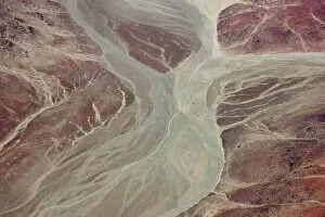 Namibia Gallery: Africa, Namibia, Damaraland. Aerial view of dry river beds running through red rock