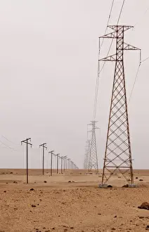 Electricity Prints: Africa, Namibia, Swakopmund. View of power and telephone lines in Namib Desert. Credit as