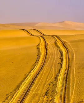 Africa, Namibia, Tire Tracks in the Desert outside Swakopmund Africa, Namibia, Tire Tracks in the Desert outside Swakopmund