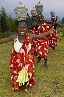 Rwanda Prints: Africa. Rwanda. Young Hutu dancers perform traditional dancing at the Mountain Gorilla