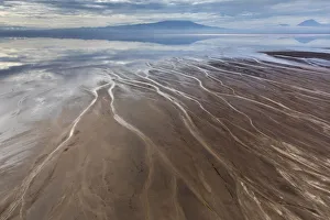 Rift Valley Prints: Africa, Tanzania, Aerial view of streams winding along shore of Lake Natron