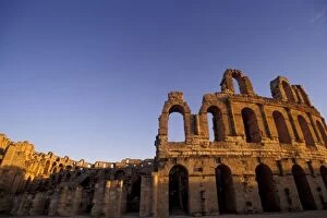 Africa, Tunisia, El Jem. Ruins of a Roman amphitheatre at sunset, built in 300 AD could seat 35