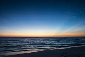 Tampa Bay Prints: Afterglow of light streaking deep blue sky of sunset scene
