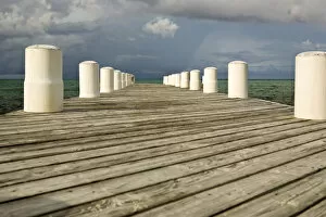 Afternnon light and dark clouds on dock in Blue Hills, Provodenciales, Turks and Caicos