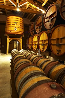 Images Dated 13th October 2005: The aging cellar with oak barrels and larger wooden vats. Chateau de Beaucastel, Domaines Perrin