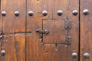 Granada Prints: Albaicin, Province of Granada, Andalusia, Spain. Peep hole on an old wooden door