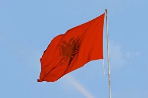 Images Dated 11th July 2006: The Albanian flag banner, red with a black double headed eagle. The Tirana Main Central Square