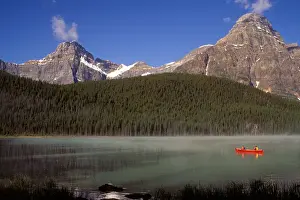 Friend Prints: Alberta, Banff National Park, Boys fishing from a red canoe in Waterfowl Lake