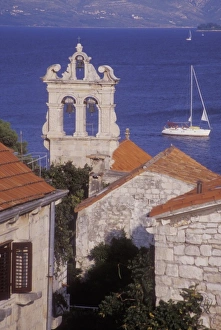 Korcula Prints: All Saints Church (Svi Sveti) with a sailboat in the background. Korcula Island. Croatia