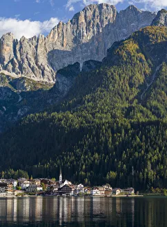 Alleghe at Lago di Alleghe under the peak of Civetta, an icon of the dolomites in