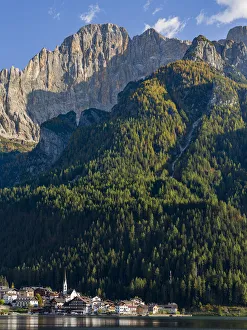 Alleghe at Lago di Alleghe under the peak of Civetta, an icon of the dolomites in