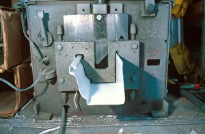 Images Dated 1st December 2005: Aluminum continuous rain gutter machine. aluminum, aluminium, extrusion, machine