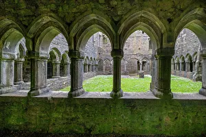 Overview Prints: Ancient cloisters surround this patch of grass at Moyne Abbey, County Mayo, Ireland
