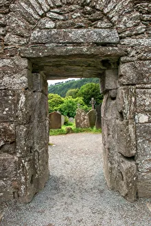 Entry Prints: Ancient door marks the passageway between the old church and graveyard at Glendalough Monastery