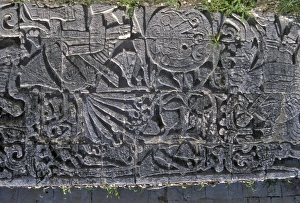 Remain Prints: Ancient Mayan stone artwork on a wall in Chichen Itza