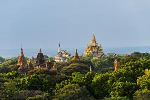 Burma Prints: Ancient temple and pagoda rising out of the jungle, Bagan, Mandalay Region, Myanmar