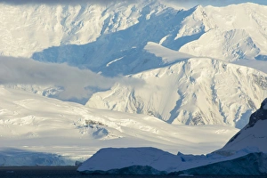 Images Dated 19th February 2014: Antarctica. Antarctic Peninsula. Paradise Harbor. Bright sunlight on the mountains beyond