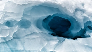 Opening Prints: Antarctica. Close-up of an artistic pattern in an iceberg