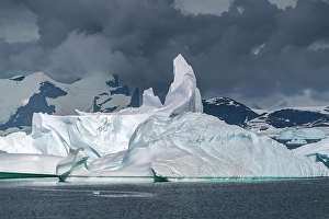 Images Dated 17th April 2024: Antarctica. Landscape with mountain and icebergs