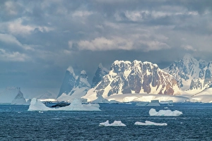 Images Dated 17th April 2024: Antarctica. Landscape with mountains and icebergs