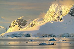 Images Dated 17th April 2024: Antarctica, Paradise Bay. Mountain reflections at sunset