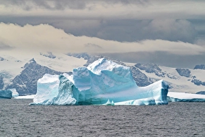 Prints of Antarctica, South Orkney Islands. Landscape with iceberg and mountains. ©Cathy and Gordon Illg / Jaynes Gallery / DanitaDelimont.com Images Dated 2024 April: Antarctica, South Orkney Islands