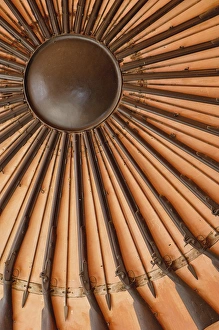 Ancient Citadel Prints: Antique guns arranged in circle on wall in Amber Fort, Jaipur, India