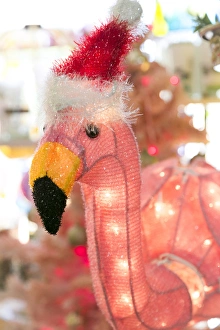 Fake Prints: Antique pink flamenco with a santa hat, Palm Springs, California, USA