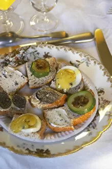 Images Dated 18th November 2005: Appetizers made with truffles: small pieces of bread with truffles butter, slices