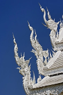Images Dated 22nd February 2006: Architectural details (Elephant & Dragon) on the new all white temple of Wat Rong