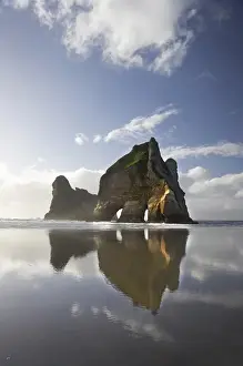 Images Dated 1st October 2008: Archway Islands Reflected in Wet Sands of Wharariki Beach, near Cape Farewell, North