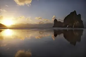 Images Dated 1st October 2008: Archway Islands Reflected in Wet Sands of Wharariki Beach at Sunset, near Cape Farewell