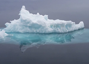 Images Dated 25th July 2015: Arctic Ocean, Norway, Svalbard. Iceberg reflects in ocean