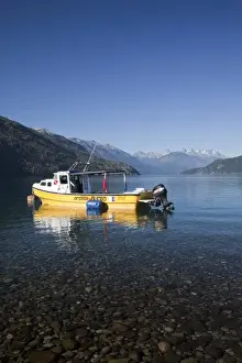 Lake District Prints: Argentina, Chubut Province, Lake Puelo National Park. Boat on Lago Puelo