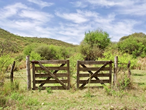 Images Dated 17th July 2024: Argentina, Cordoba Province. Fence in the countryside