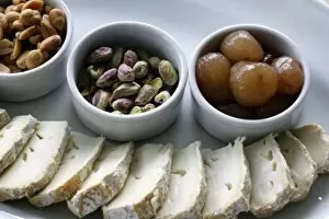 Argentina, El Calafate. Argentinean apertivo: cheese, pistachios, peanuts and marinated baby onions