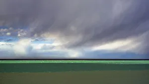 Images Dated 29th May 2019: Argentina, Santa Cruz. Puerto Santa Cruz, river Santa Cruz under stormy clouds