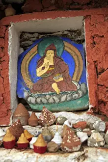 Ledge Prints: Asia, Bhutan, Paro. Miniature clay stupas rest on ledge of Taktsang trailside altar